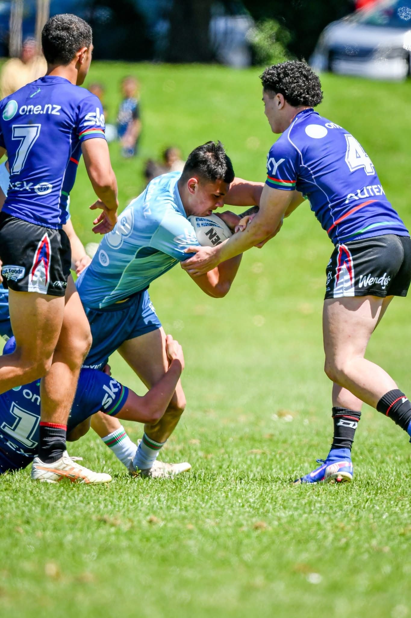 Carson carrying the ball at the Auckland rugby league trial