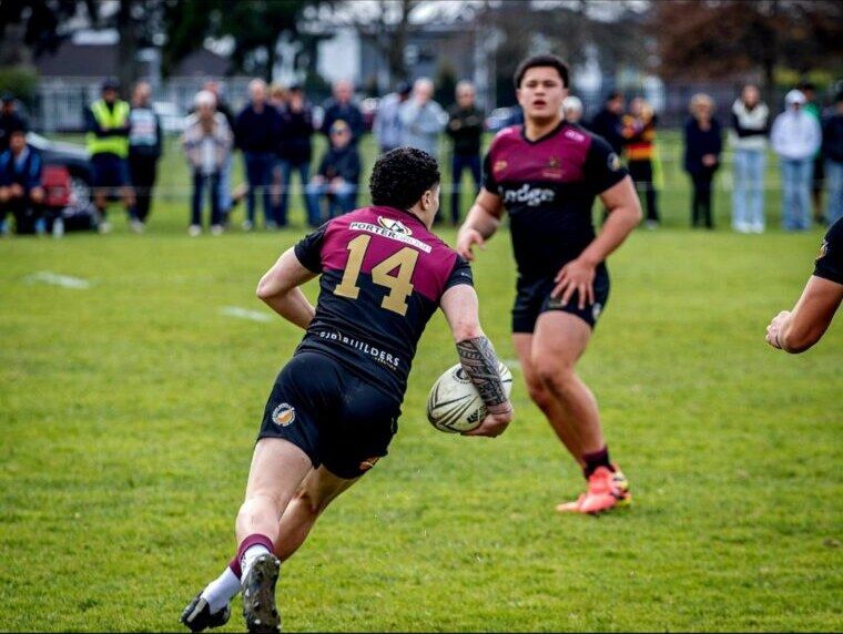 Carson Hunter carrying into contact in Hamilton Boys’ High School colours